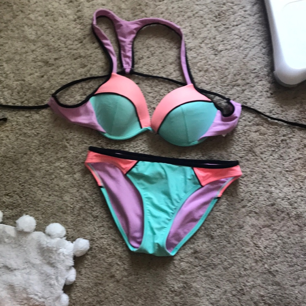 Color block bathing suit some piling on left breast